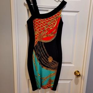 Designer Dress! Size 10. Multi color. Simply stunning, eye-catching.
